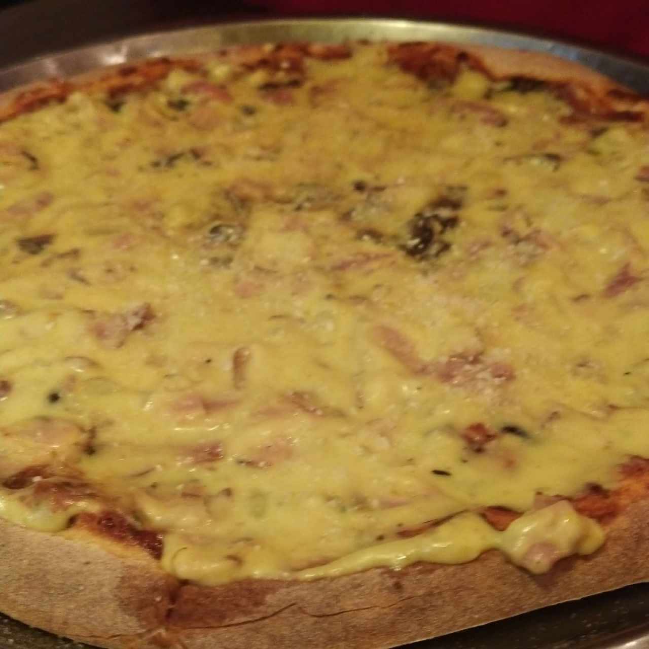 Pizza Mediana Capressa una locura densa pero bien así que preparense